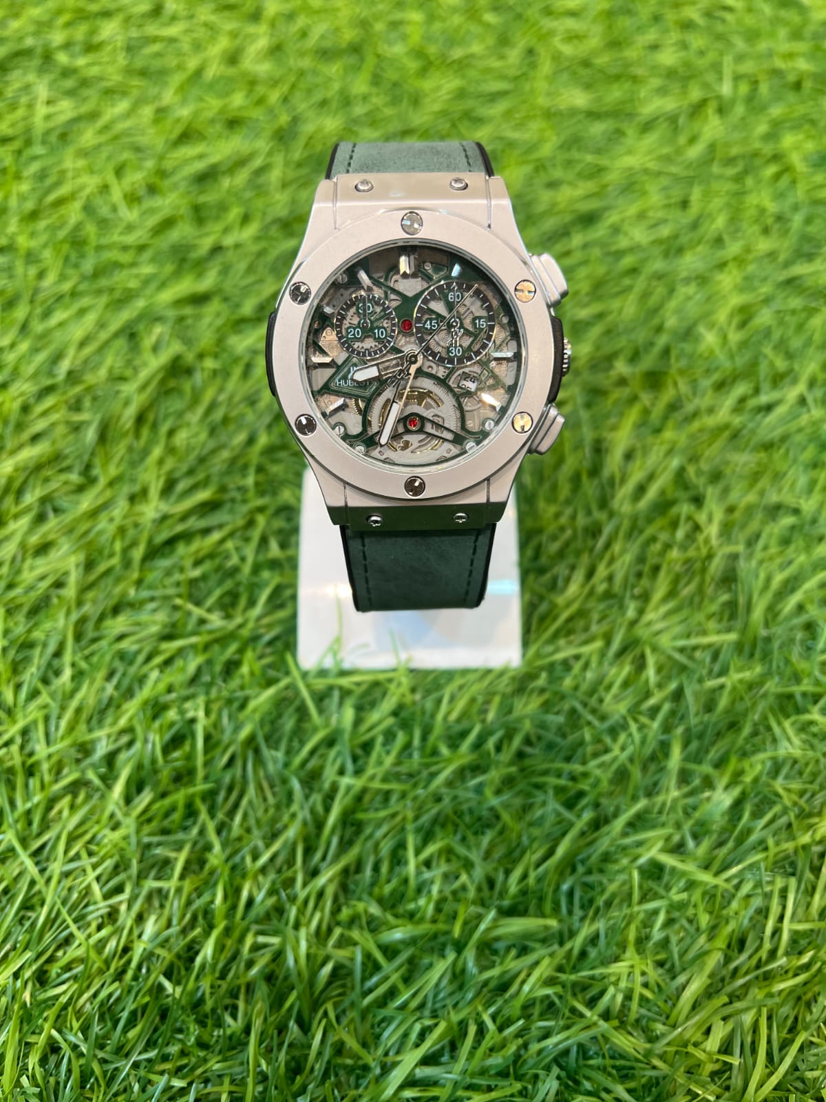 Hublot Classic Fusion watch with a silver dial and a stainless steel bracelet.