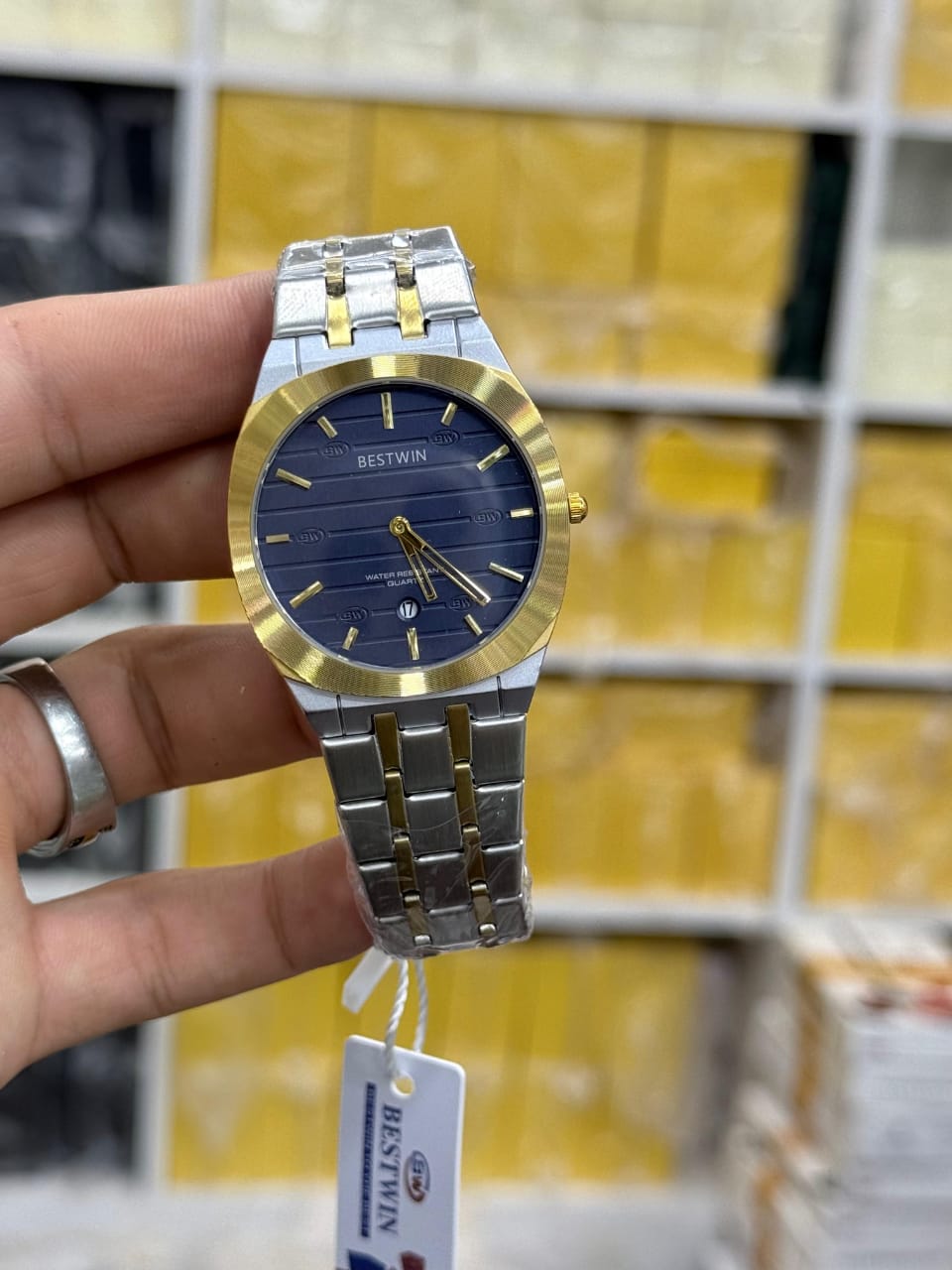 Bestwin men's stainless steel quartz watch.