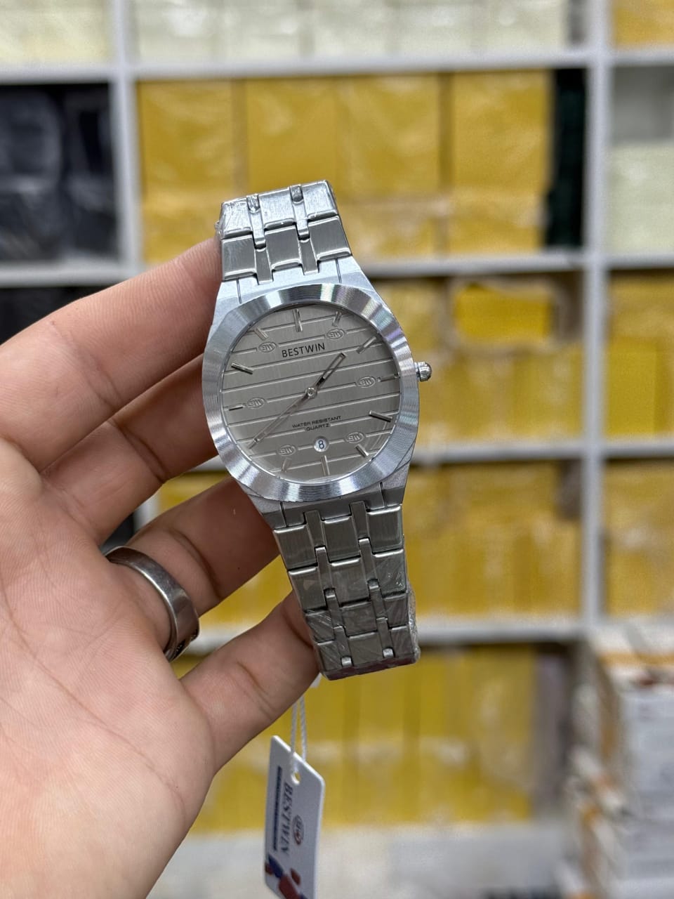 Bestwin men's stainless steel quartz watch.