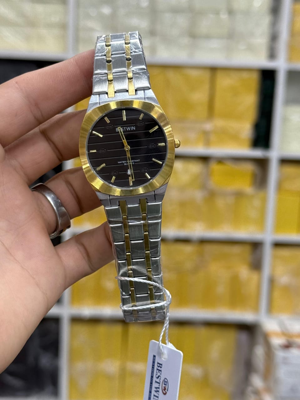 Bestwin men's stainless steel quartz watch.