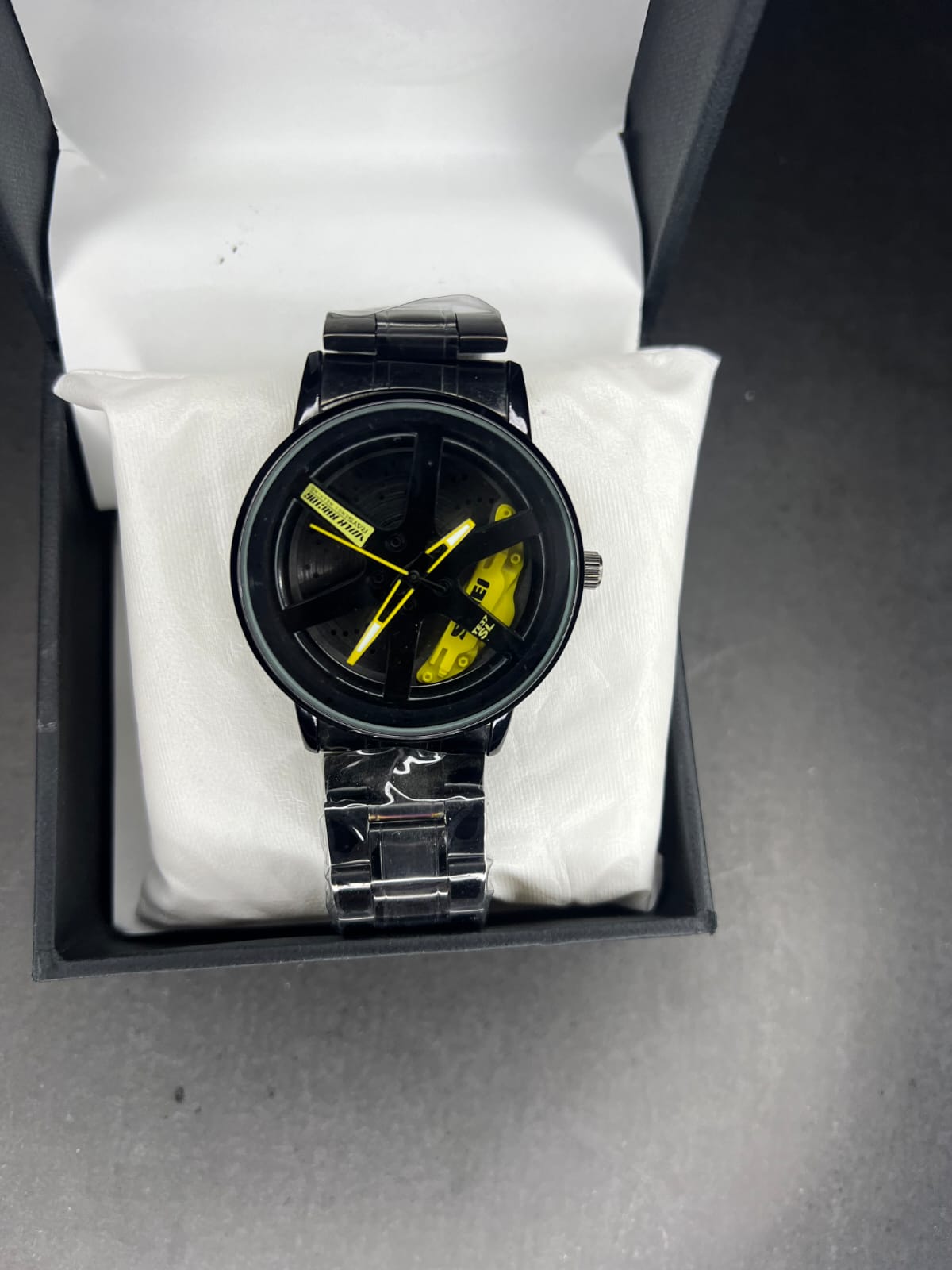 STAINLESS STEAL WHEEL WATCH WITH A SPINNING ALLOY