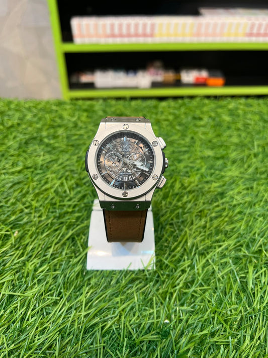 Hublot Classic Fusion watch with a silver dial and a stainless steel bracelet. 