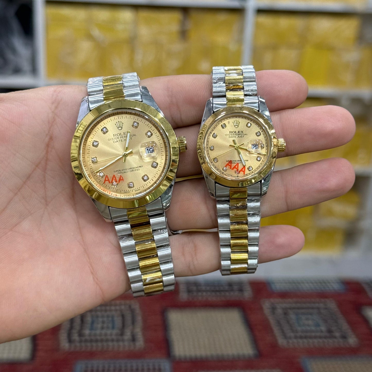 Rolex Datejust watch, featuring a two-tone stainless steel and gold design with a gold