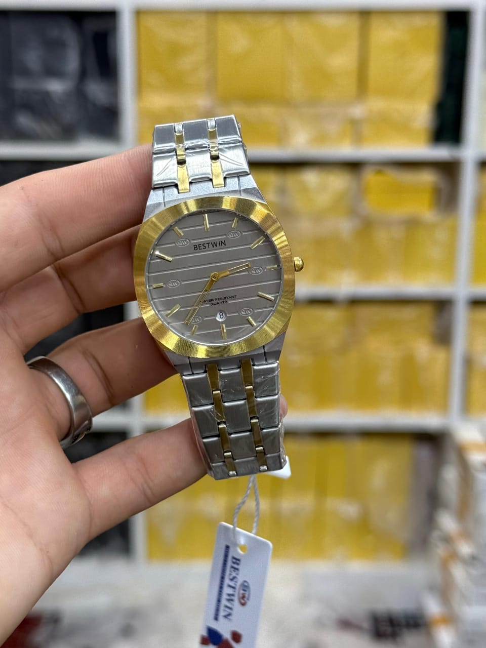 Bestwin men's stainless steel quartz watch.